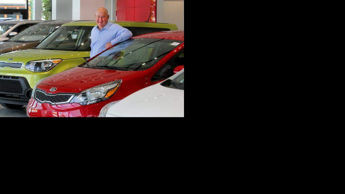 
Jay Gunther in the showroom at his new Fort Lauderdale Kia building on State Road 7. Gunther Motors, a group that is expanding its Kia dealership in Lauderdale, just bought a store in Delray Beach and also recently added a multimillion-dollar parking garage at a Coconut Creek dealership. 
