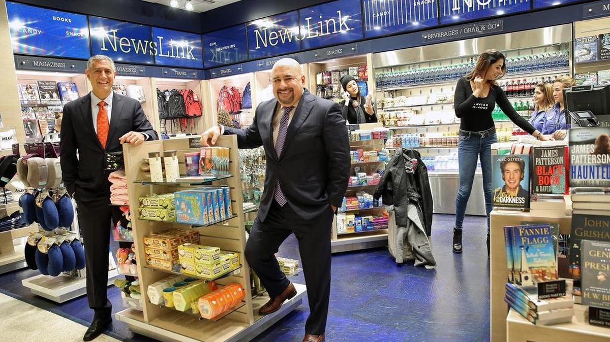 Ray Kayal Jr., left, and Chris Korge in a NewsLink store at Miami International Airport. NewsLink Group operates 22 locations in five major airports, some as subsidiaries with partners, or with major retailers under licensing agreements.