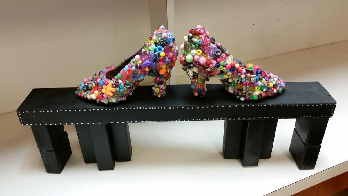 ​I received a lovely gift from the Education Fund. It was a pair of funky shoes that were designed by one of the children participating in the For the Love of Art Charity auction. I have the shoes in my office and look at them regularly. They keep me in a happy place because they make me think of the Wizard of Oz and remind me of my childhood. Rachel Sapoznik, CEO & president, Sapoznik Insurance Shown: Child-designed shoes that Sapoznik received. www. education fund. org (Consider a donation)