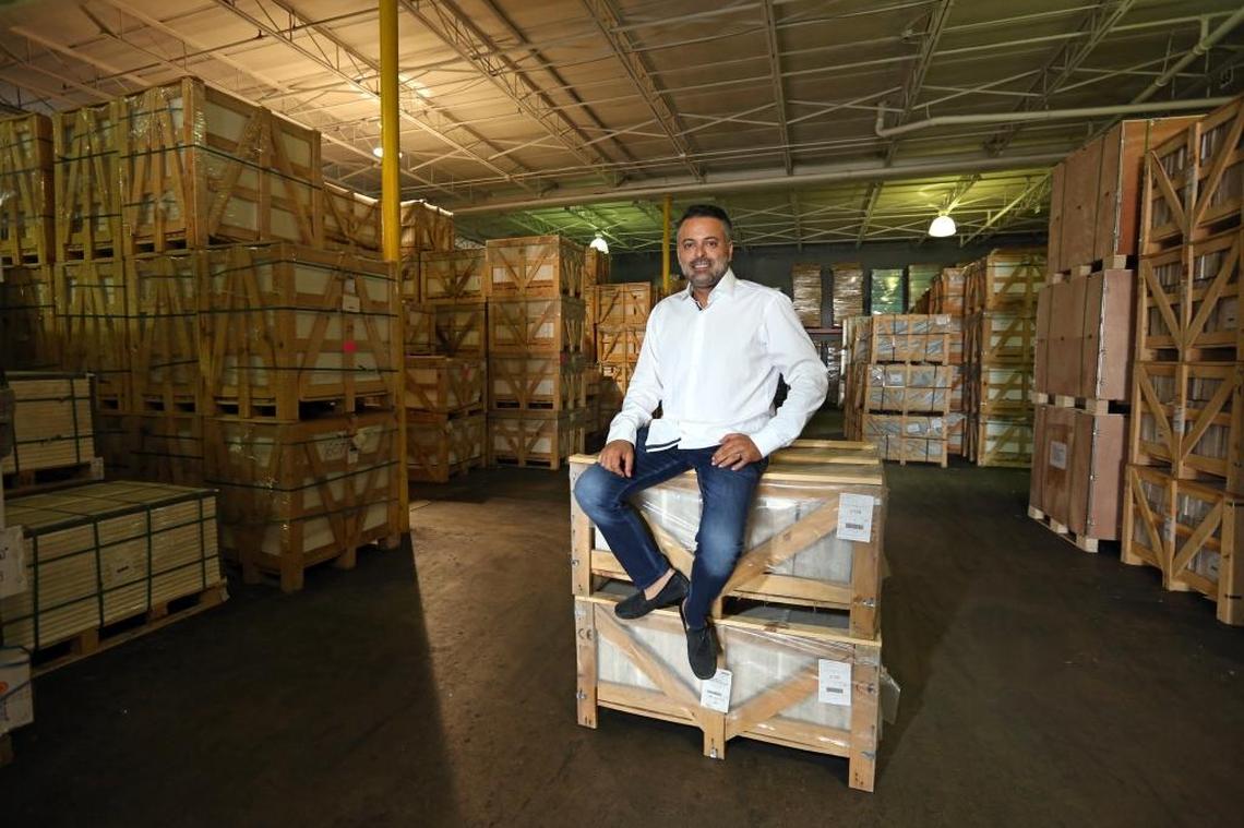 BOS Group CEO/Founder Ozan Baran in his Allapattah warehouse.