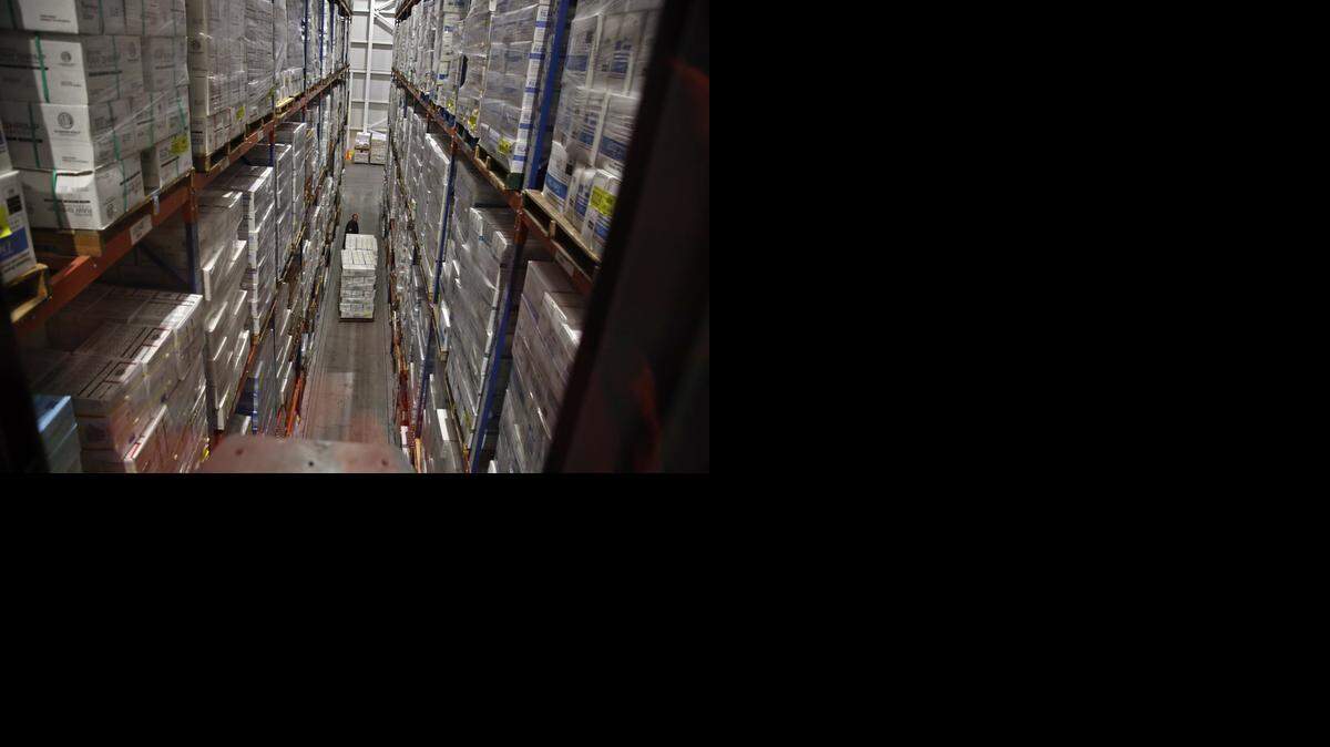 
TALL ORDER: Rod Armesto, sales manager, moves seafood to the storage area at Preferred Freezer Services new facility in Hialeah Gardens.
