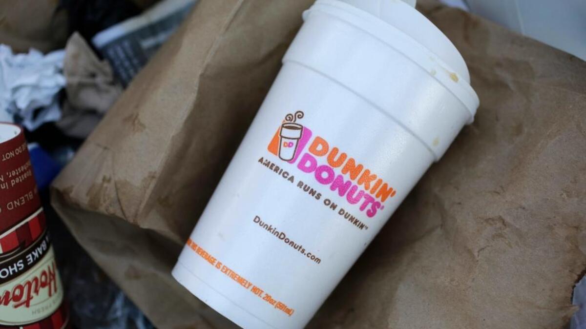 A Dunkin’ Donuts' foam cup is discarded in a trash bin in New York. Dunkin’ Donuts said on Feb. 7 that the polystyrene foam cups will be completely phased out from all its stores globally by 2020 — a highly responsible act.