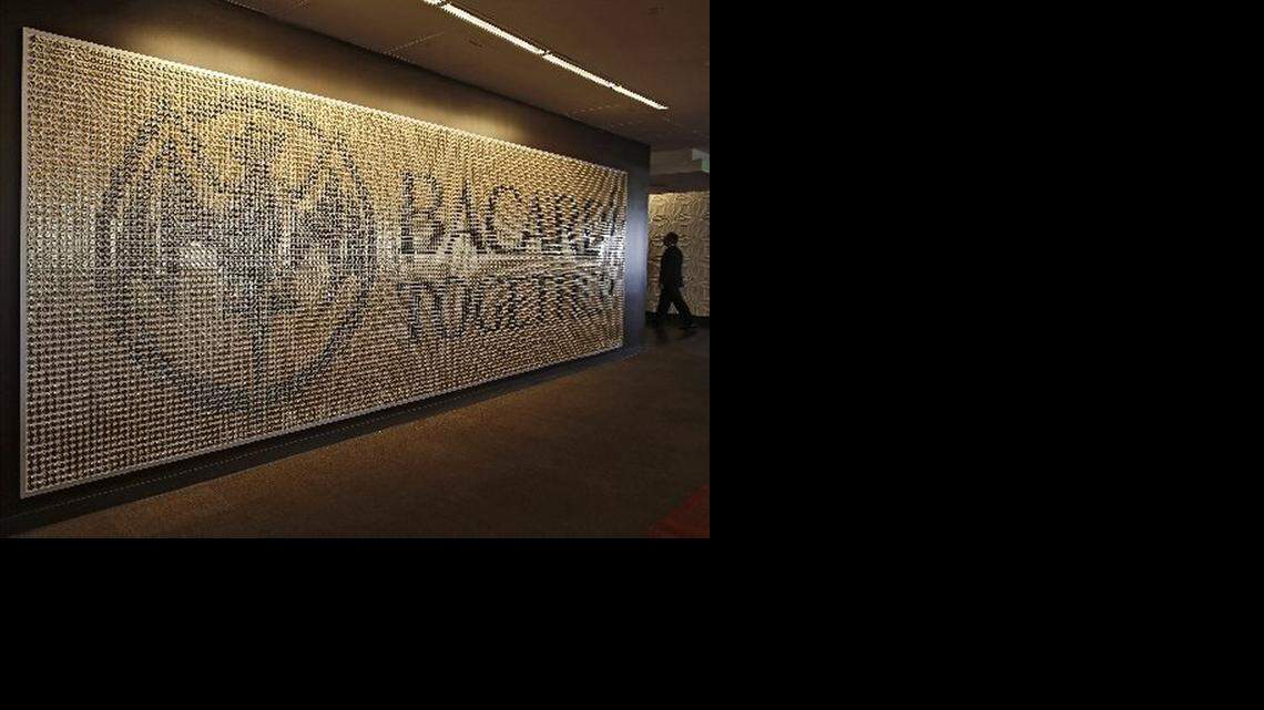 
Art is displayed throughout the hallways and offices of Bacardi's corporate Gables office. Pictured is a piece made of thousands of bottle caps. Downtown Coral Gables has 4.5 million square feet of office space within minutes from the airport and downtown Miami's financial center. It has become a center for many businesses to locate their offices. 

