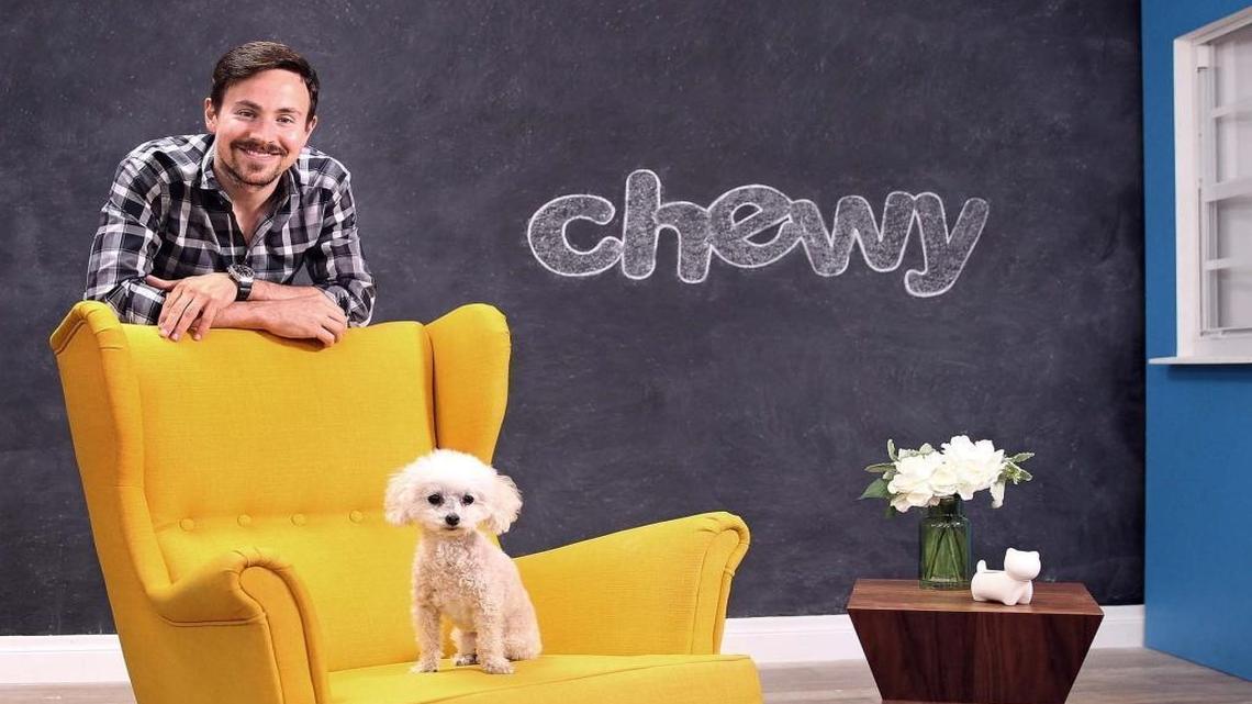Ryan Cohen, CEO of Chewy.com, and his poodle Tylee at the company’s photo studio in Dania Beach.