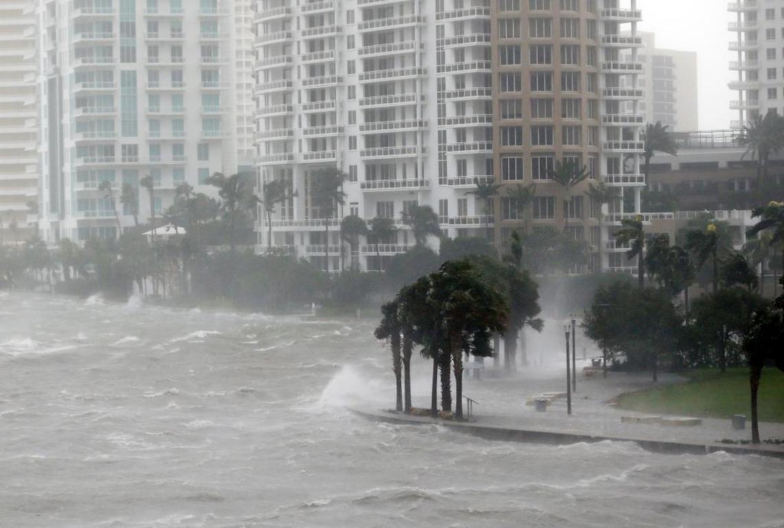 Waves crash over a seawall at the mouth of the Miami River from Biscayne Bay as Hurricane Irma passes by. Irma put a focus on ways to shape a more resilient Miami.
