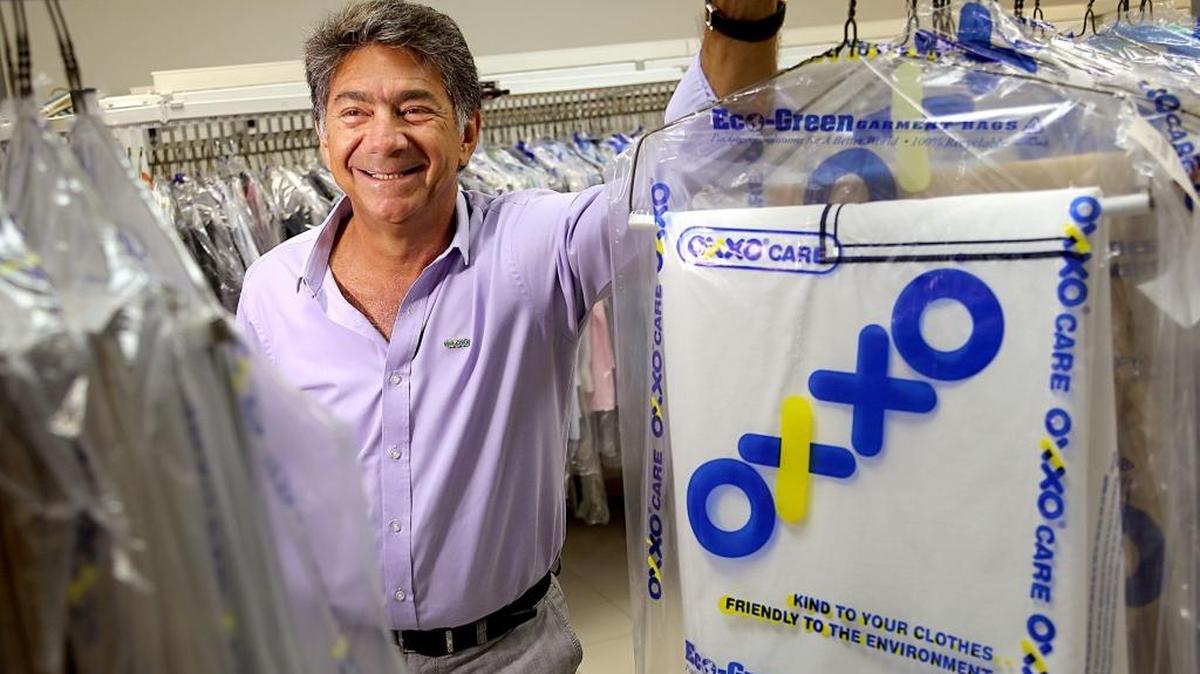 Salomon Mishaan is president of OXXO Care Cleaners, a drop-off or pick-up, eco-friendly dry cleaning service that lets customers use an around-the-clock ATM-inspired system. He is shown at his company’s Hollywood location.