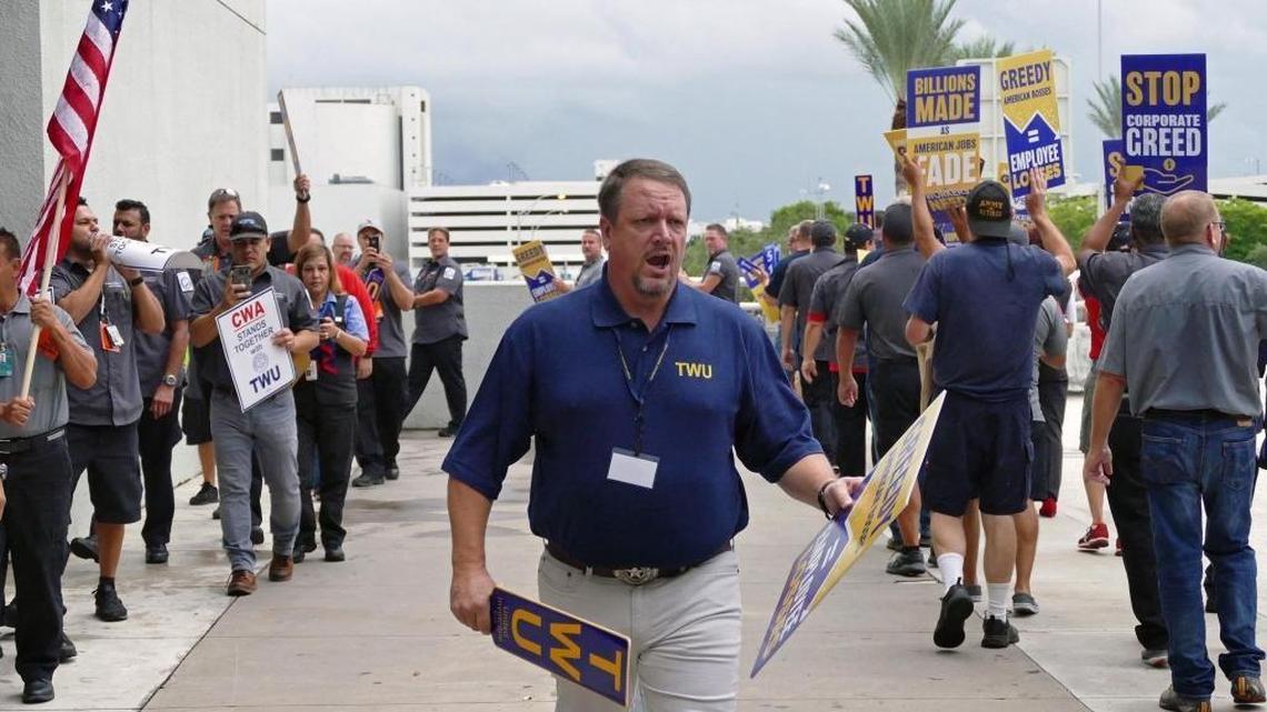 Transport Workers Union Union Locals 568 and 591 protest outside of American Airlines at MIA on Thursday, August 24, 2017. They claim the company plans to ship additional jobs overseas. The union has been in contract negotiations with the airline for 18 months.