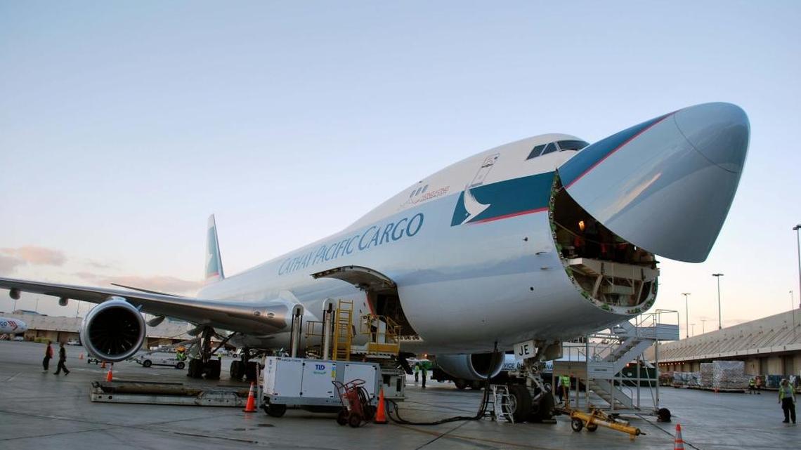 One of Cathay Pacific’s cargo planes unloading at Miami International Airport