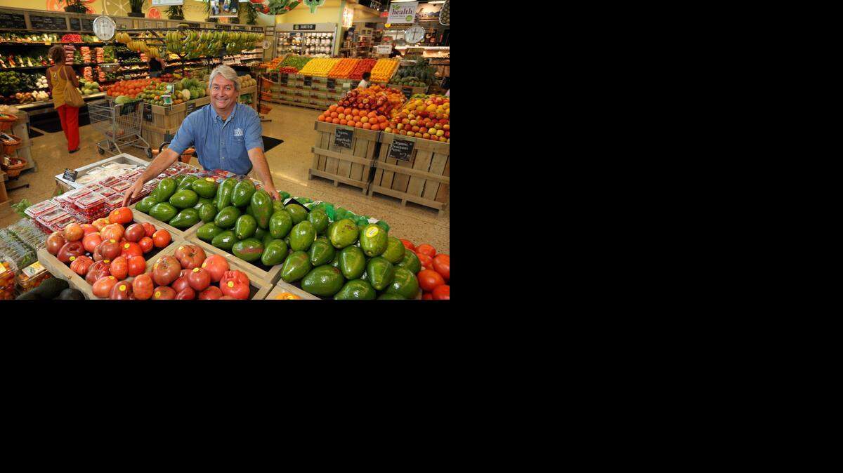 
Juan Nunez, president Florida region, for Whole Foods Market, in the produce section at the 12150 Biscayne Blvd. store. 
