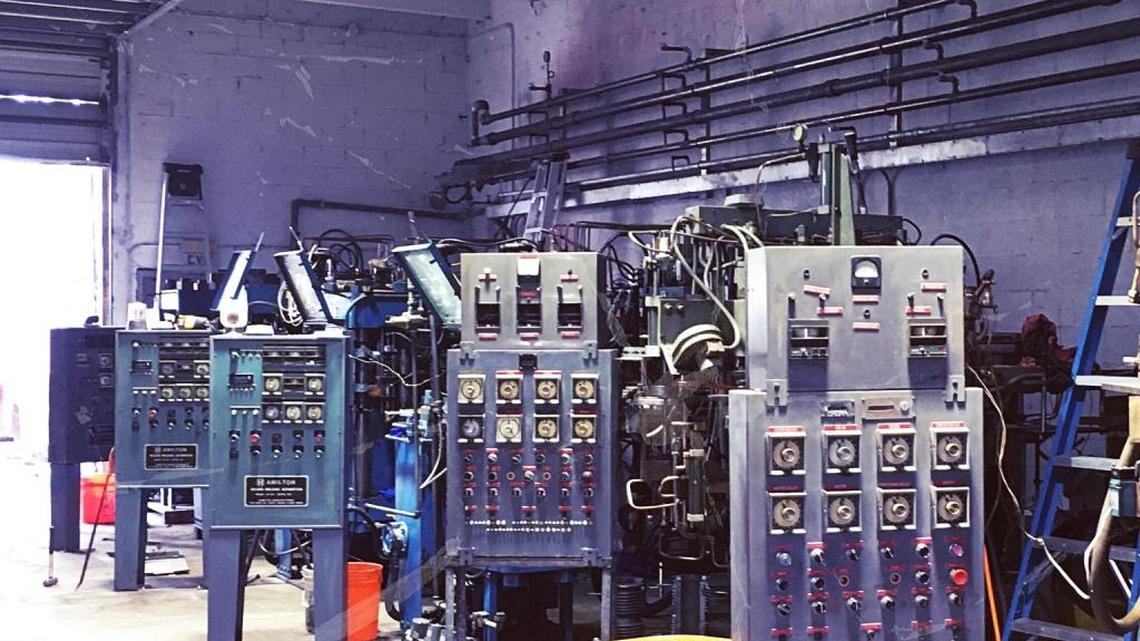 The factory floor at SunPress Vinyl, a vinyl record pressing plant in Opa-Locka.