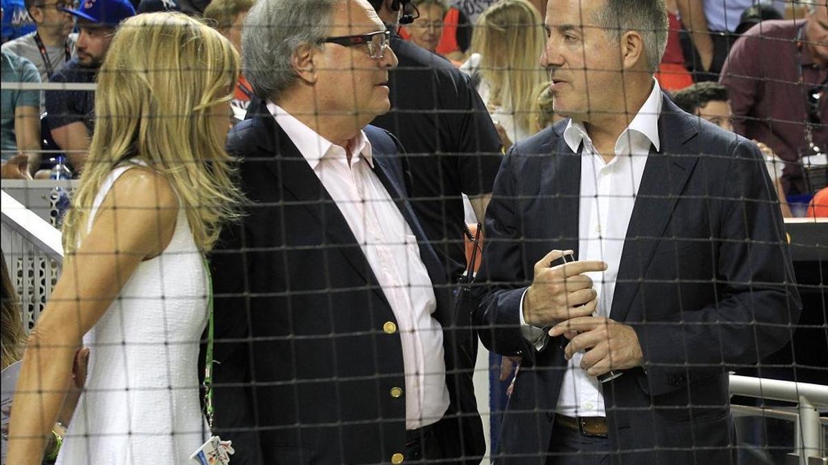 Miami Marlins owner Jeffrey Loria (center) and his wife July, chat with Miami businessman Jorge Mas, one of the bidders to buy the Miami Marlins during the MLB baseball All-Star game between the National League and the American League on July 11 at Marlins Park in Miami.