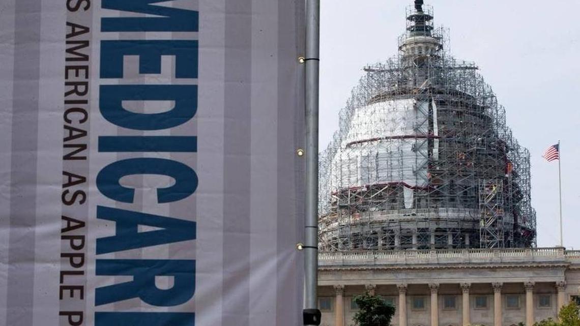 In this July 30, 2015 file photo, a sign supporting Medicare is seen on Capitol Hill in Washington.