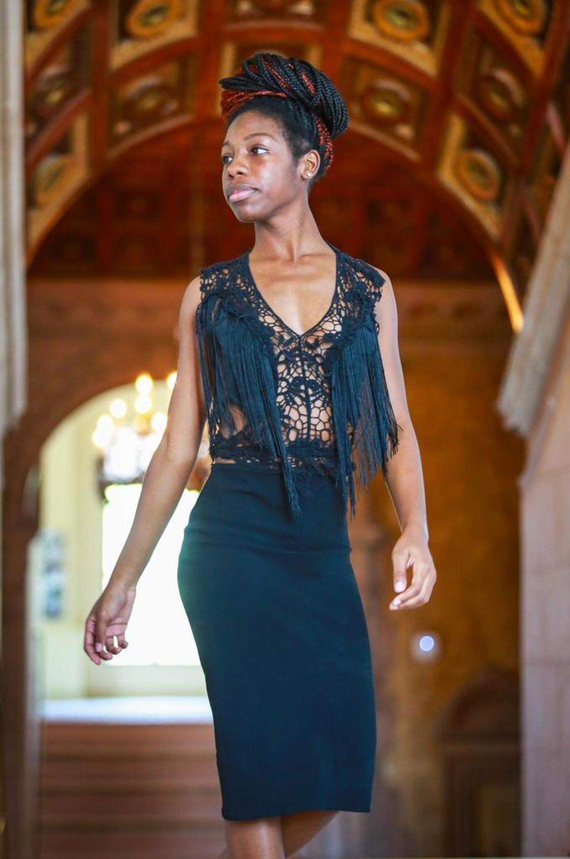 A model shows one of the upcycled fashions created by James Young, a student at the Miami Fashion Institute at Miami Dade College. Young will be participating in a student exhibit on upcycled fashion at Miami Fashion Week.