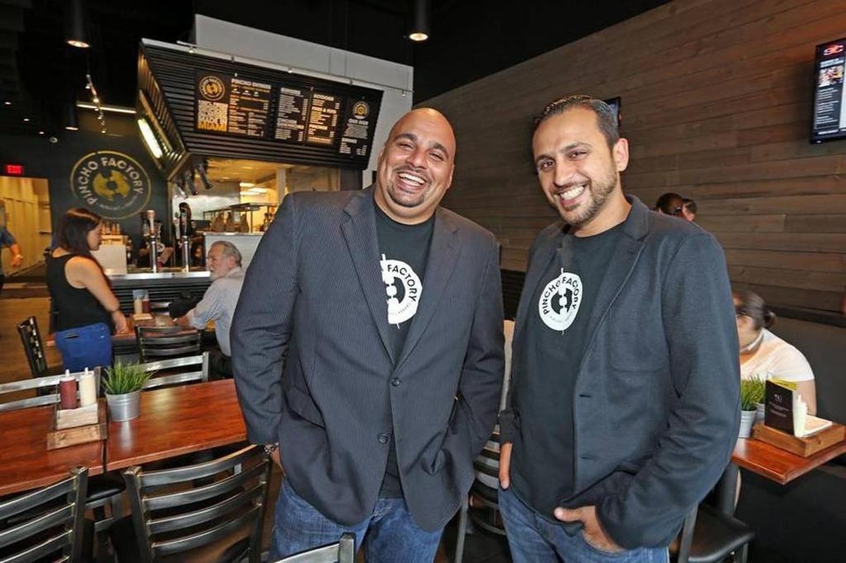Cousins Nedal Ahmad and Otto Othman of the Pincho Factory, a Miami-based fast-casual food company that has plans to expand. The two founded the company with Nizar Ahmad.