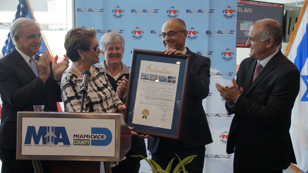 Miami-Dade County Commissioner Rebeca Sosa hands El Al president CEO David Maimon a proclamation to make Nov. 1m 2017 El Al Day in Miami-Dade County.