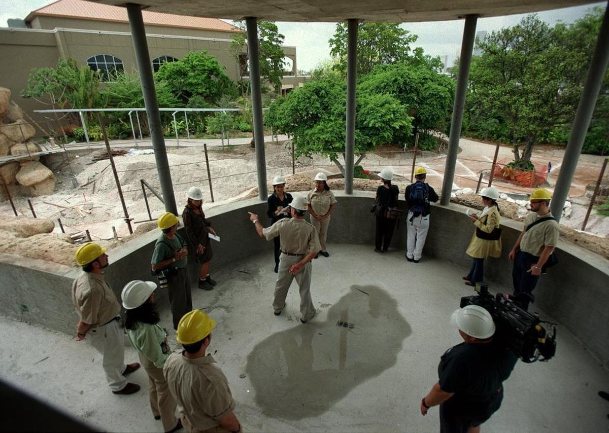 Jeff Shimonski, director of horticulture at Parrot Jungle, explains to the media how the new Parrot Bowl area will be used during a site tour in May 2003. The park opened to the public on Watson Island on June 28, 2003.