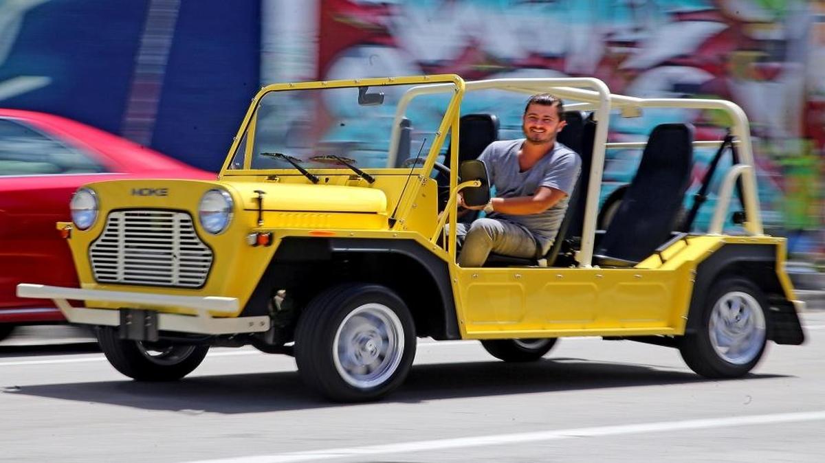 John Temerian, Moke USA’s managing partner, drives a Moke through Wynwood, July 6, 2017. The iconic vehicle from the ‘60s and ‘70s once counted the Beach Boys, Frank Sinatra, George Harrison and even James Bond among its fans. Moke USA re-launched the car in the U.S. this year.