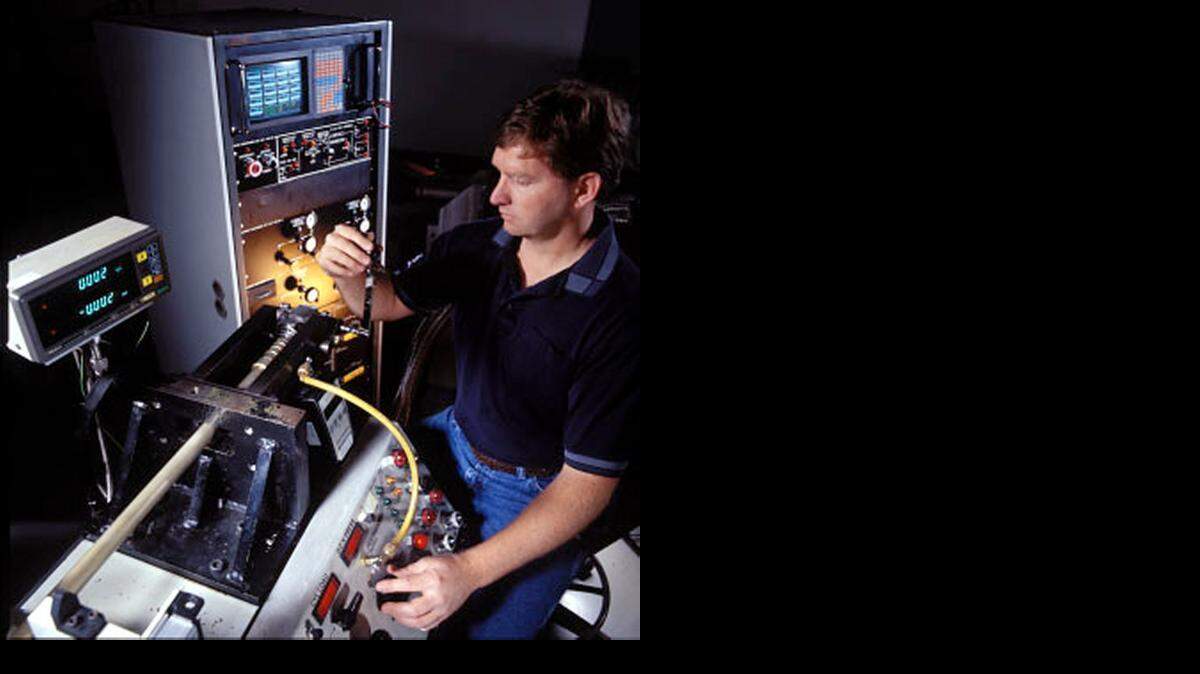 
A technician tests an overhauled position switch from an aircraft thrust reverser at Harter Aerospace in Arizona. 
