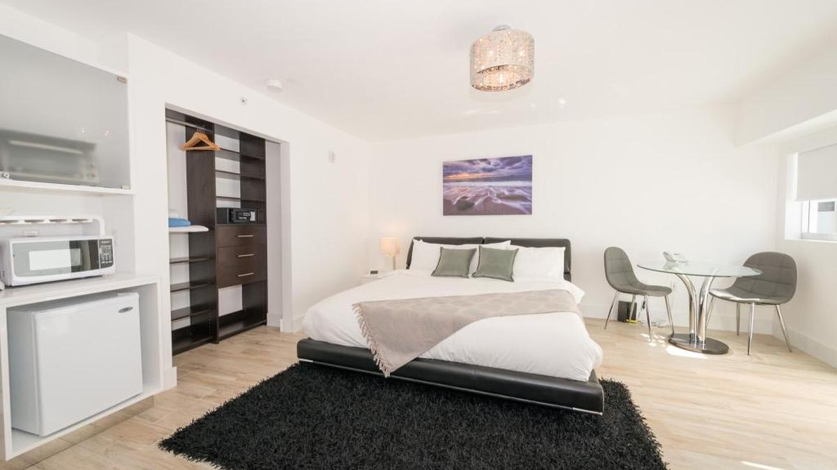 A bedroom in a Boutique 18 unit. General manager Tal Alon says the company looks for units in areas zoned for short-term rentals that can be legally listed on Airbnb.