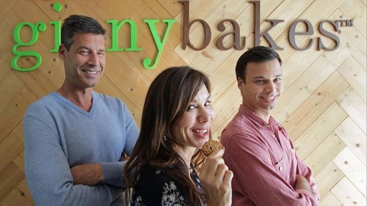 Ginnybakes, which made organic, gluten-free snacks, ws run by the family team of Steve Simon, president, left, his wife, Ginny Simon, CEO/founder, and son Michael Simon, vice president. CARL JUSTE cjuste@miamiherald.com