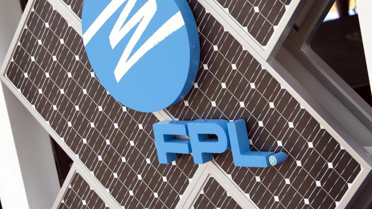 A display panel with FPL’s logo was part of the unveiling ceremony for a solar array at the College of Engineering at Florida International University, April 27, 2016. Faculty and students will use the 1.4-megawatt cluster to find solutions to a statewide energy challenge to keep the power on in all weather. The solar system came through a five-year, $660,000 research grant.
