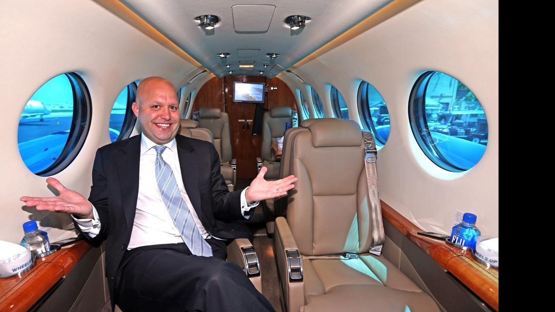 
Justin Firestone, a founding partner of Wheels Up, in one of the company’s King Air 350i turboprops, June 12, 2015. Companies are opening up "flight sharing" opportunities for their clients. Wheels Up is a company that just started letting clients offer up empty seats on their flights to other Wheels Up customers to lower the price of flying privately.
