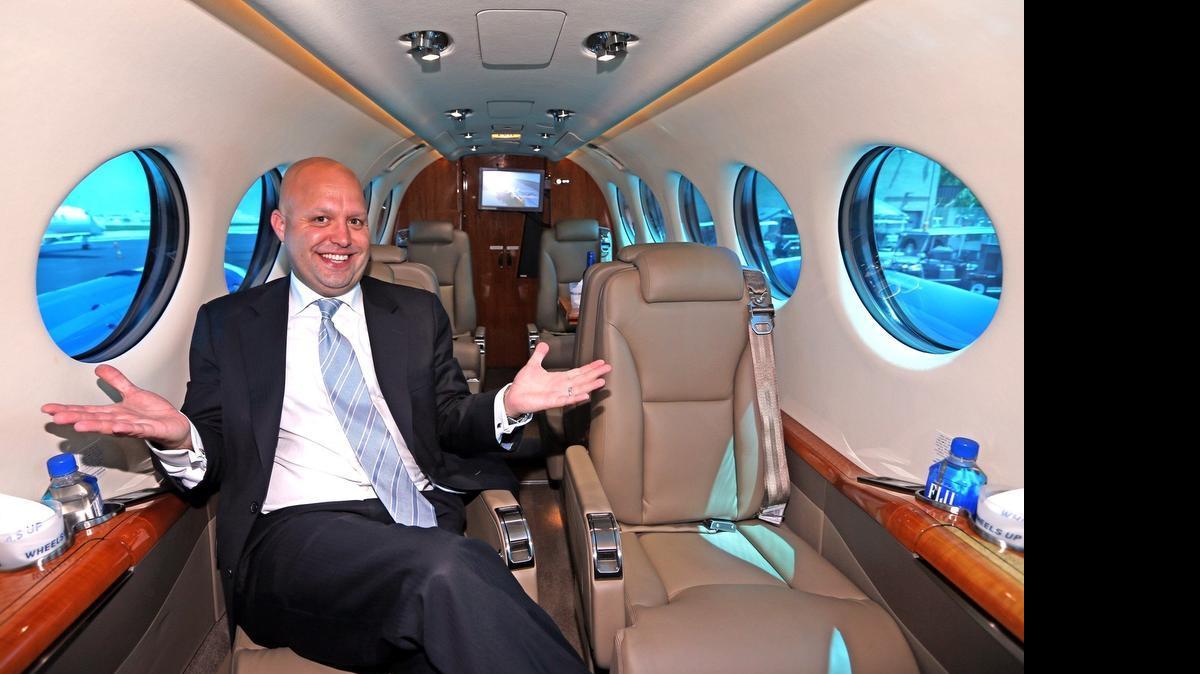 
Justin Firestone, a founding partner of Wheels Up, in one of the company’s King Air 350i turboprops, June 12, 2015. Companies are opening up "flight sharing" opportunities for their clients. Wheels Up is a company that just started letting clients offer up empty seats on their flights to other Wheels Up customers to lower the price of flying privately.

