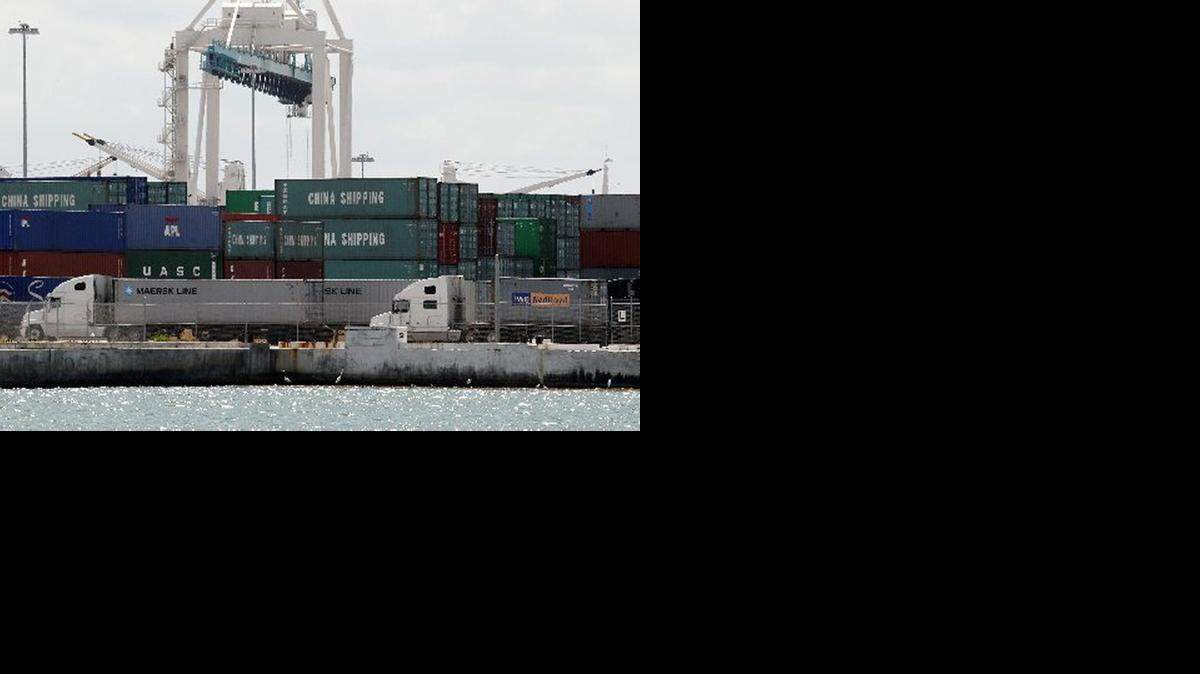 
In this Thursday, Oct. 7, 2010 photo, shipping containers are shown stacked for distribution at the Port of Miami in Miami. 
