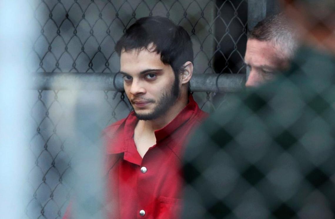 Esteban Santiago is taken from the Broward County main jail as he is transported to the federal courthouse in Fort Lauderdale, on Monday, Jan. 9, 2017. Santiago is accused of fatally shooting several people at a crowded Florida airport baggage claim and faces airport violence and firearms charges that could mean the death penalty if he's convicted.