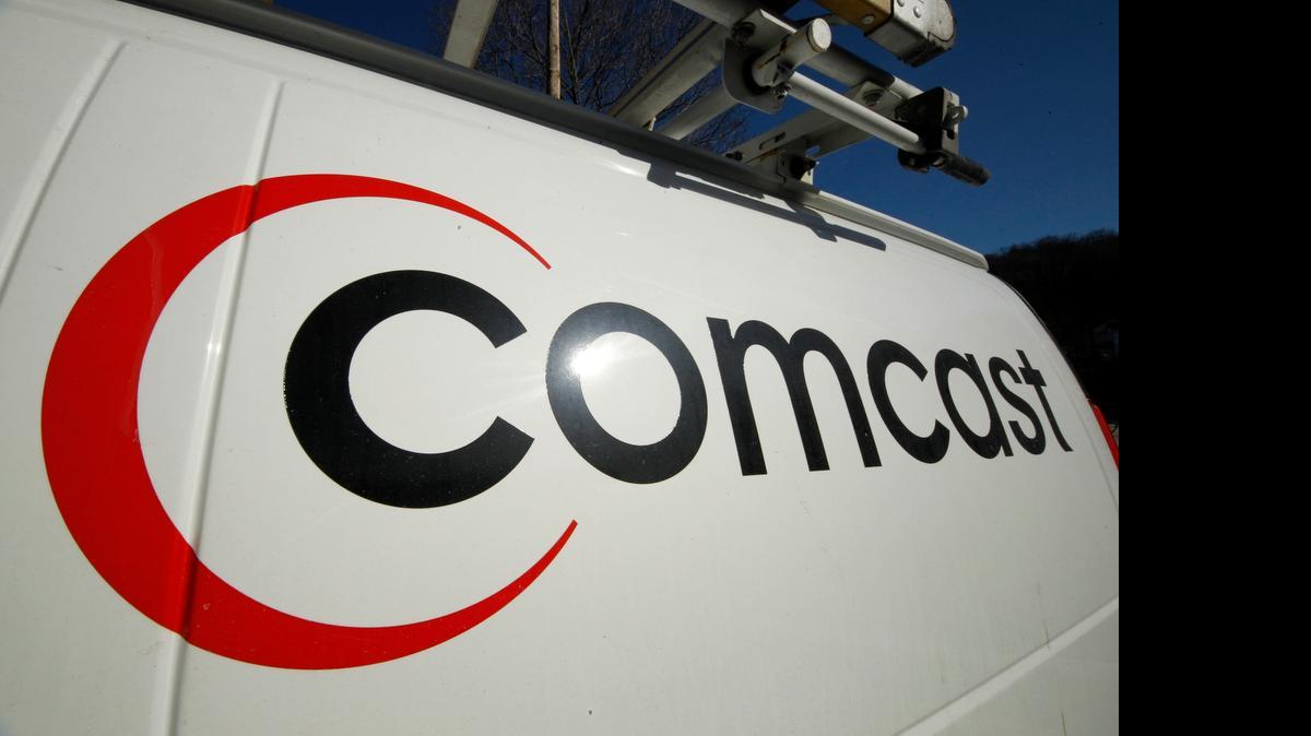 
This Feb. 2011 file photo shows the Comcast logo on one of the company's vehicles in Pittsburgh. It appears that Comcast’s $45.2 billion purchase of Time Warner Cable is dead. 
