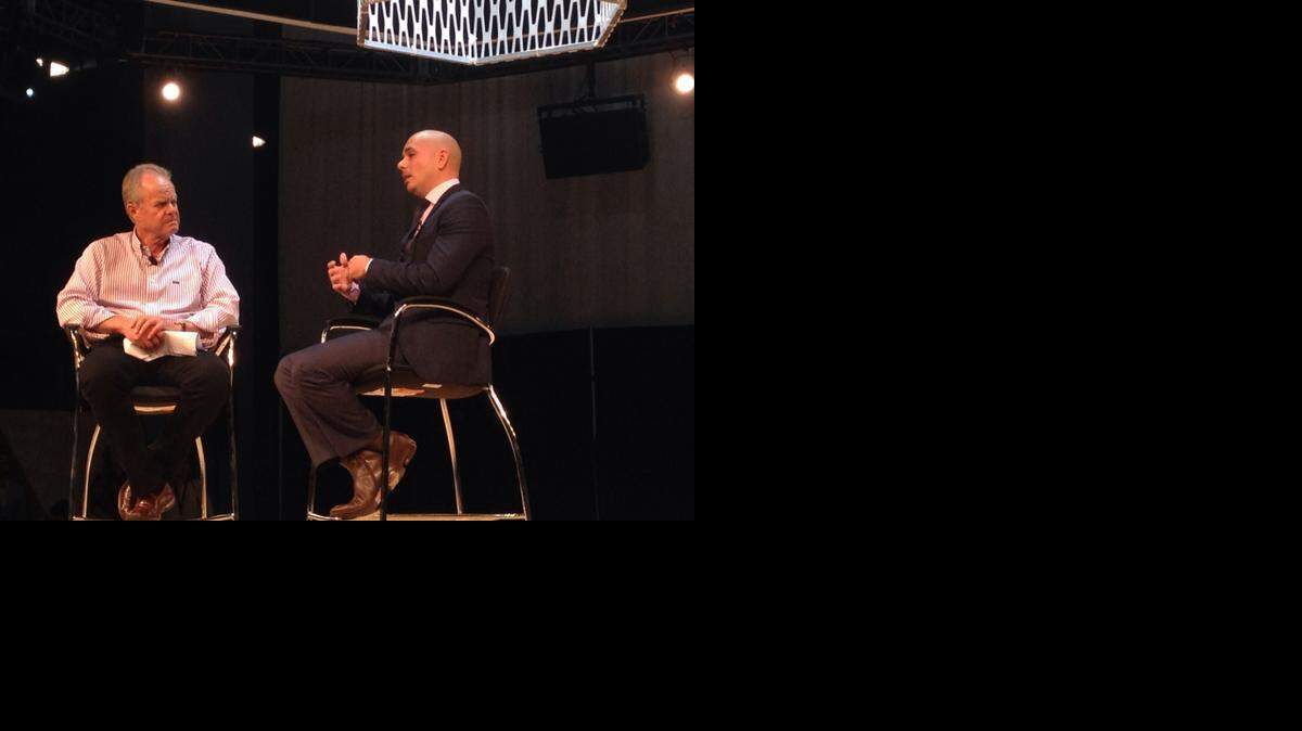 
eMerge Americas founder Manny Medina and Armando Christian Perez, aka Pitbull, speak at the closing of the inaugural eMerge Americas conference, May 6, 2014, at the Miami Beach Convention Center.
