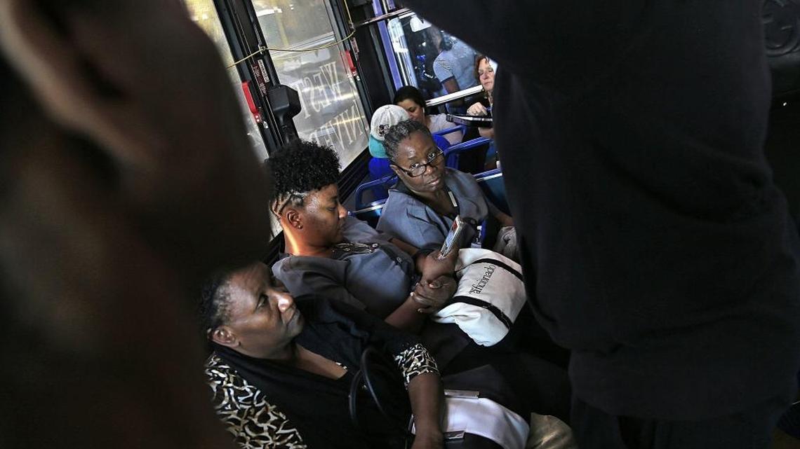 Fontainebleau housekeeper Odelie Paret, right, has been working at the Fontainebleau Miami Beach hotel for 21 years. She and many other housekeepers at the hotel — and across others on Miami Beach — have long commutes to work. Once at work, many reported a number of worker challenges.