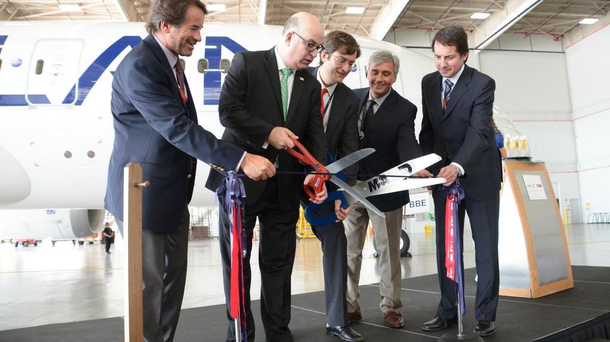 From left: Cutting the ribbon to inaugurate LATAM Airlines Group’s first maintenance hangar in the United States at MIA on Wednesday: Cristian Ureta CEO, LAN Cargo; Emilio T. Gonzalez, Director, Miami-Dade Aviation; Sebastian Acuto, VP of Maintenance and Engineering for LATAM Airlines Group; Martin Donnari, VP of Maintenance and Engineering for LAN Cargo; Carlos Larrain. Senior Vice President, LAN Cargo.