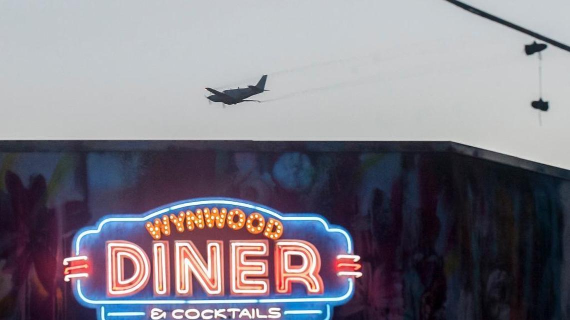 A contractor for the Miami-Dade County Department of Solid Waste Management (DSWM) conducts mosquito control aerial spraying over Wynwood and the surrounding areas in order combat the spread of Zika on Thursday, Aug. 4, 2016.