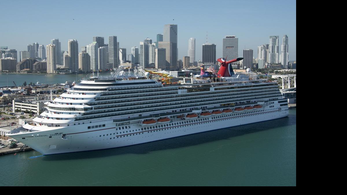 
Carnival Breeze is shown at PortMiami in this 2012 photo. Carnival Cruise Line will no longer allow passengers to bring bottled beverages on board in an attempt to cut down on alcohol smuggling. 
