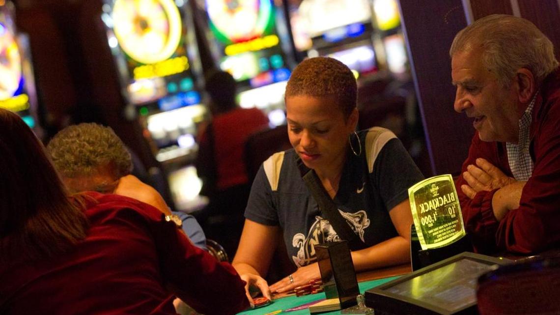 Lisa Johnson of Bel Air, Maryland, and Louis Cohen of Delray Beach watch the dealer during a hand of blackjack at the Seminole Hard Rock Casino in Hollywood, Wednesday June 22, 2011.