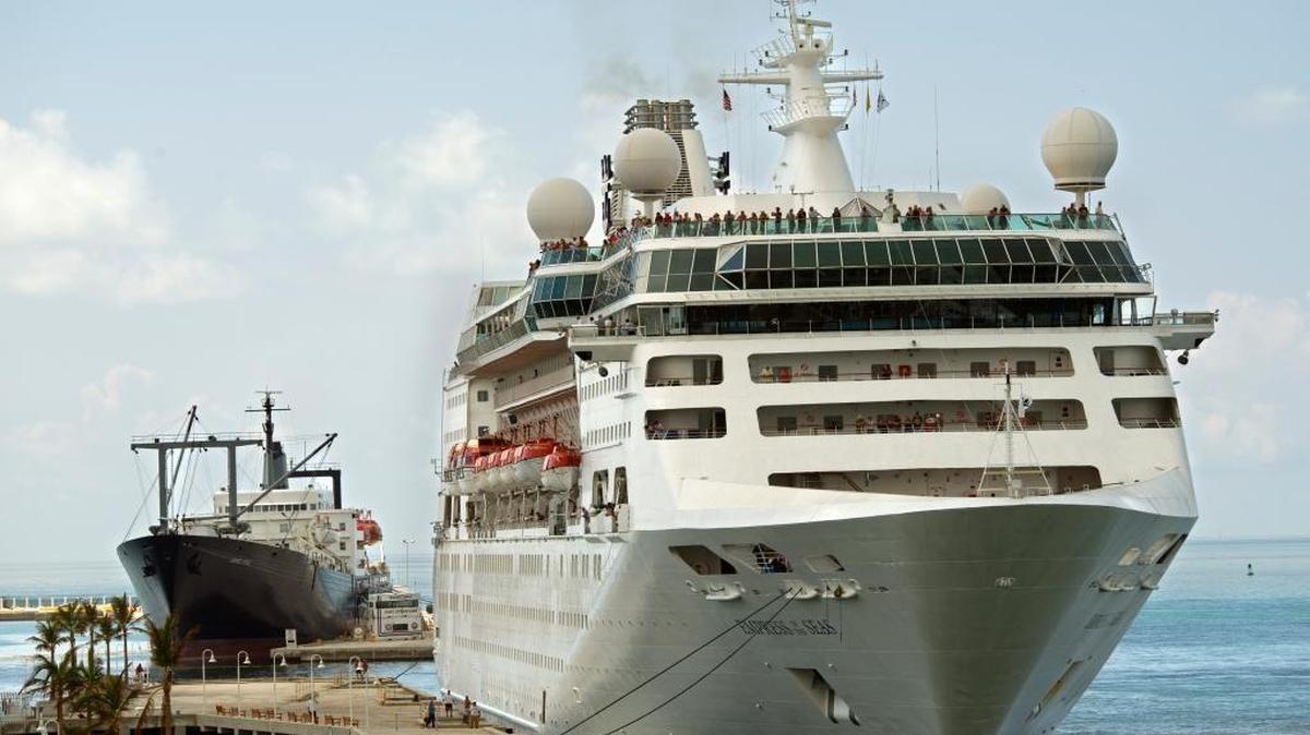 The Empress of the Seas, right, docks at Pier B Sunday, Sept. 24, 2017, in Key West, Fla. The ship’s port call marked the first time a cruise ship has docked in Key West since prior to Hurricane Irma’s passage through the Florida Keys. At left is the Empire State, a ship used to house recovery workers.