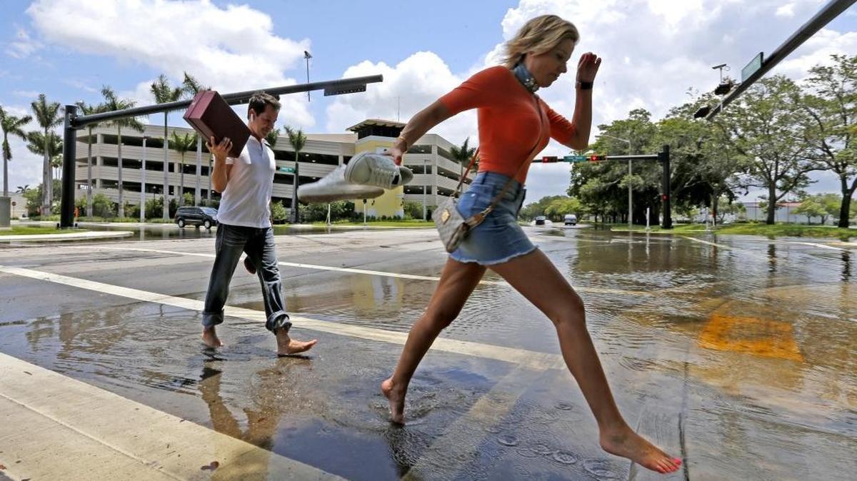 Shoppers Sid and Ania leave Sawgrass Mills mall after finding the doors closed for a second day on Thursday, June 8, 2017.