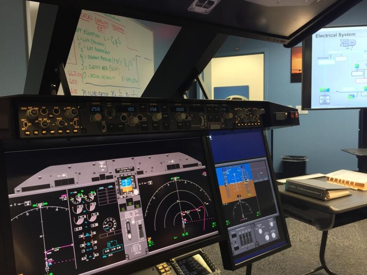 Old school overlaps with new school at a 737 MAX simulation training room at Boeing’s Miami Campus, where the aircraft manufacturer unveiled its training suites for the new 737 due to begin service in June with delivery of the first of 3,700 aircraft to some 87 airlines.