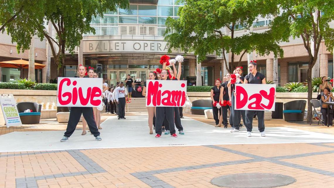 Booker T. Washington High School marching band and the Gablettes dance squad from Coral Gables High School cheer for Give Miami Day at the Arsht.