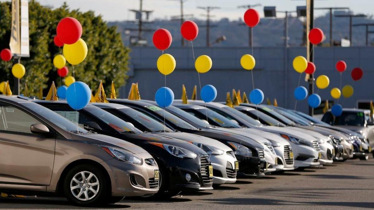 Happy days for auto sales: Hyundai cars sit on display for sale on the lot of a dealership in Los Angeles on Saturday.