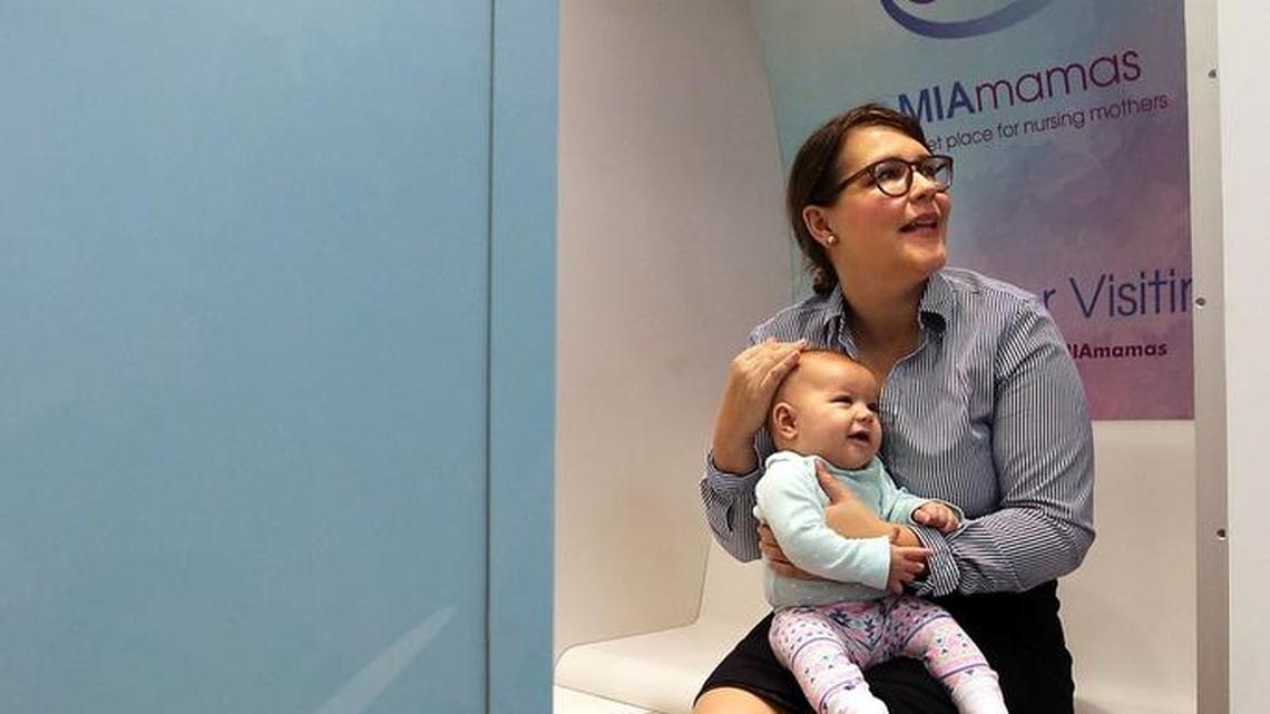 Adele Valencia and her 5-month-old daughter Lily Louise Valencia get a look at the interior of a MIAmamas nursing suite at Miami International Airport on Thursday, September 1, 2016. MIA is debuting eight nursing suites manufactured by Mamava around the airport.