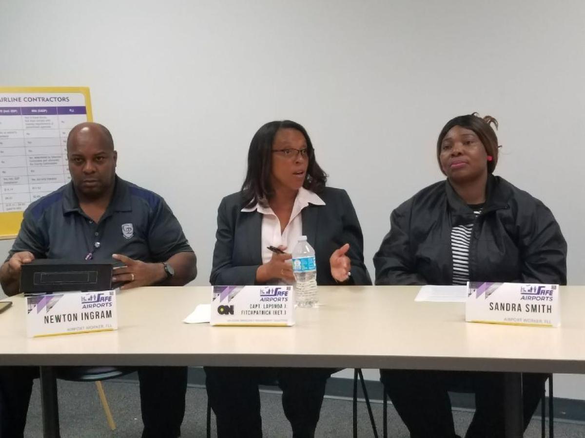 Capt. LaPonda Fitchpatrick, center, speaks at a press conference held by workers union SEIU 32 BJ regarding recommendations for improving emergency protocols at Fort Lauderdale-Hollywood International Airport. Fitchpatrick was involved in implementing safety measures at Los Angeles International Airport after 9/11.