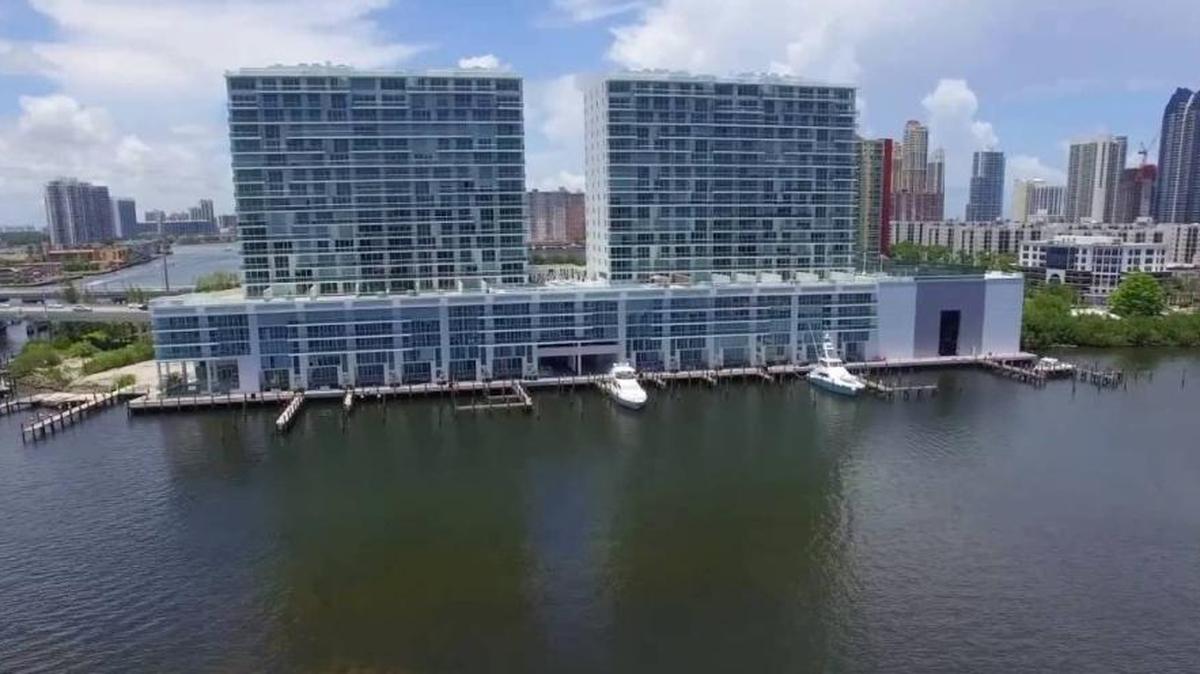 A screenshot from a YouTube video shows the 400 Sunny Isles luxury condominium project, developed by Key International Development and 13th Floor Investments.