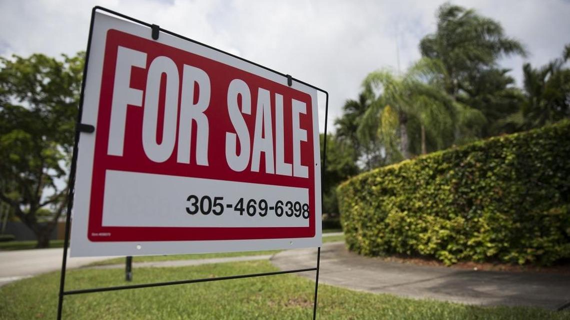 A sign posted outside a home for sale on Southwest 112th Street in Pinecrest.