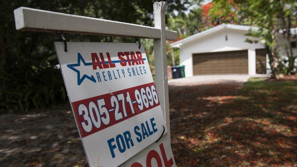A sign posted outside a home for sale on Southwest 74th Avenue in Pinecrest.