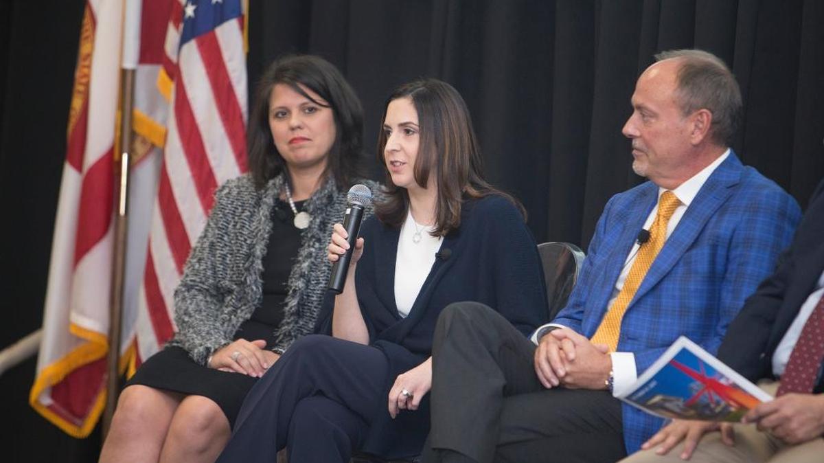 Ana-Marie Codina-Barlick, center, flanked by Doral Councilwoman Ana Maria Rodriguez and Steve Patterson, president and CEO of Related Development, at a Friday panel on Doral real estate produced by the Miami Herald.