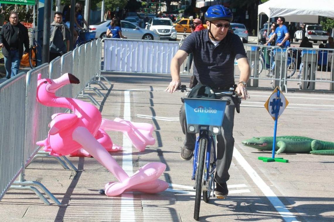 Carlos Fallon rides a Citi Bike in Bayfront Park in 2014. The bike-sharing program is administered by DecoBike.