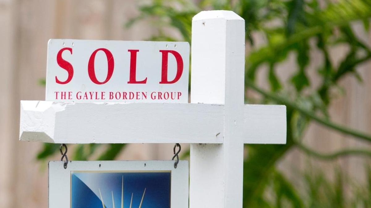 A "sold" sign is posted outside a Harbor Beach neighborhood home in Fort Lauderdale. Tuesday, Nov. 24, 2015.