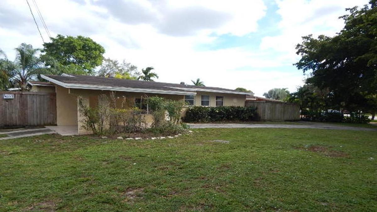 Foreclosures are starting to tick upward across the country. Above: This three-bedroom, two-bath house in the Sunset area sold in December 2017 in a foreclosure.